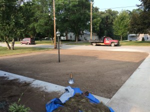 Yard stripped of the old grass and leveled.